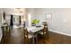 Bright dining room features hardwood floors and a view into the living room at 2107 Penrose Dr, Atlanta, GA 30344