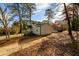 House exterior showcasing a side view and driveway at 2107 Penrose Dr, Atlanta, GA 30344