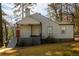 Charming house with covered porch and gray siding at 2107 Penrose Dr, Atlanta, GA 30344