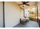 Relaxing front porch with ceiling fan and seating area at 2107 Penrose Dr, Atlanta, GA 30344