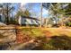 Front view of house with mature landscaping at 2107 Penrose Dr, Atlanta, GA 30344