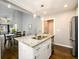 Kitchen island with granite countertop and double sink at 2107 Penrose Dr, Atlanta, GA 30344