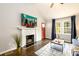 Spacious living room with fireplace and hardwood floors at 2107 Penrose Dr, Atlanta, GA 30344