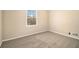 Spacious bedroom with neutral decor and carpet flooring at 2343 Maryland Ct, Decatur, GA 30032