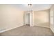 Well-lit bedroom with neutral walls and carpeted floor at 2343 Maryland Ct, Decatur, GA 30032