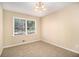 Bright bedroom with neutral wall and carpeting at 2343 Maryland Ct, Decatur, GA 30032