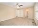 Large bedroom with ceiling fan and access to bathroom at 2343 Maryland Ct, Decatur, GA 30032