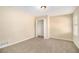 Well-lit bedroom with neutral walls and carpet at 2343 Maryland Ct, Decatur, GA 30032