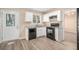 Renovated kitchen with granite countertops and new appliances at 2343 Maryland Ct, Decatur, GA 30032