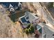 Aerial view showing house backyard, deck, and neighborhood at 7570 Weston Club Dr, Suwanee, GA 30024