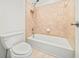 Clean bathroom with shower/tub combo and toilet at 7570 Weston Club Dr, Suwanee, GA 30024