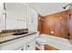 Bathroom with granite vanity and tile shower/tub at 7570 Weston Club Dr, Suwanee, GA 30024