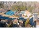 Aerial view of community amenities including tennis courts and pool at 7570 Weston Club Dr, Suwanee, GA 30024