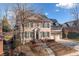 Brick two-story house with gray shutters, attached two-car garage, and landscaping at 7570 Weston Club Dr, Suwanee, GA 30024