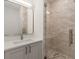 Modern bathroom with a walk-in shower and floating vanity at 1237 Memorial Se Dr # 403, Atlanta, GA 30316