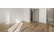 Spacious bedroom with hardwood floors and access to bathroom at 1237 Memorial Se Dr # 403, Atlanta, GA 30316