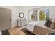 Spacious bedroom with hardwood floors, large windows, and ceiling fan at 1237 Memorial Se Dr # 403, Atlanta, GA 30316