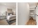 Bright bedroom with built-in shelving and walk-in closet at 1237 Memorial Se Dr # 403, Atlanta, GA 30316