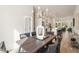 Open concept dining room with hardwood floors and kitchen views at 1237 Memorial Se Dr # 403, Atlanta, GA 30316