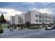 Modern apartment building exterior with people walking near by at 1237 Memorial Se Dr # 403, Atlanta, GA 30316