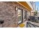 Modern brick building with two front doors and a welcoming mat at 1237 Memorial Se Dr # 403, Atlanta, GA 30316