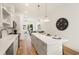 Open concept kitchen with island and stainless steel appliances at 1237 Memorial Se Dr # 403, Atlanta, GA 30316