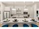 Modern kitchen with a large island and white cabinets at 1237 Memorial Se Dr # 403, Atlanta, GA 30316
