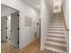 Clean stairway with light hardwood floors and modern handrail at 1237 Memorial Se Dr # 403, Atlanta, GA 30316
