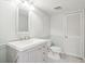 Updated bathroom with new vanity, mirror and a tiled floor at 3036 Vinings Ferry Se Dr, Atlanta, GA 30339