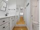 Modern bathroom with a new vanity and full length mirror at 3036 Vinings Ferry Se Dr, Atlanta, GA 30339