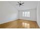 Spacious bedroom features light hardwood floors and natural light from the window at 3036 Vinings Ferry Se Dr, Atlanta, GA 30339