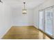 Dining room with hardwood floors and modern lighting at 3036 Vinings Ferry Se Dr, Atlanta, GA 30339