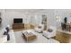 Open living room featuring hardwood floors, modern furniture, and a view of the kitchen at 3036 Vinings Ferry Se Dr, Atlanta, GA 30339