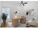 Bright home office with large desk, comfortable chair, and natural light at 3036 Vinings Ferry Se Dr, Atlanta, GA 30339