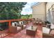 Outdoor patio with seating area and dining set perfect for entertaining at 3036 Vinings Ferry Se Dr, Atlanta, GA 30339