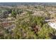 Aerial view of property showing wooded lot and location at 3820 Mink Livsey Rd, Snellville, GA 30039