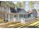 Large deck overlooking a wooded area at 3820 Mink Livsey Rd, Snellville, GA 30039