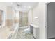 Bathroom features double sinks, soaking tub, and walk-in shower at 3820 Mink Livsey Rd, Snellville, GA 30039