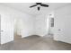 Well lit bedroom with carpet and multiple doors at 3820 Mink Livsey Rd, Snellville, GA 30039