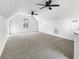 Spacious bonus room featuring two ceiling fans and window at 3820 Mink Livsey Rd, Snellville, GA 30039