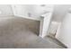 Large bonus room with neutral carpet and ample space at 3820 Mink Livsey Rd, Snellville, GA 30039