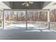 Covered deck overlooking a wooded area at 3820 Mink Livsey Rd, Snellville, GA 30039