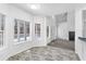 Bright dining area with large windows and wood-look flooring at 3820 Mink Livsey Rd, Snellville, GA 30039