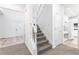 View of the staircase from the entryway at 3820 Mink Livsey Rd, Snellville, GA 30039