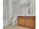 Clean bathroom with vanity, toilet, and bathtub at 381 Paper Woods Dr, Lawrenceville, GA 30046