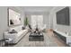 Bright living room featuring a comfy sofa, large TV, and stylish coffee table at 381 Paper Woods Dr, Lawrenceville, GA 30046
