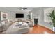 Spacious living room with hardwood floors and fireplace at 381 Paper Woods Dr, Lawrenceville, GA 30046