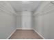 Large walk-in closet with wire shelving, providing excellent storage space at 381 Paper Woods Dr, Lawrenceville, GA 30046