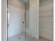 Spacious shower with subway tile and built-in bench at 7125 Winderlea Ln, Cumming, GA 30040