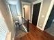 Elegant staircase with dark wood railings and carpet at 1365 Memorial Se Dr # 3, Atlanta, GA 30317